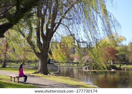 BOSTON,MASSACHUSETTS/US-MAY 6: Boston Public Garden with first signs of spring in Boston may 6 2015. Boston Public Garden is perhaps the main public park in the Back Bay area of Boston.