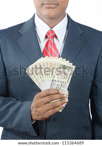 indian business man holding indian money