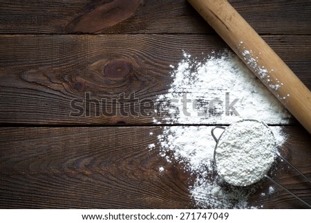 Ingredients for cooking baking on dark wooden table. background for writing  recipes