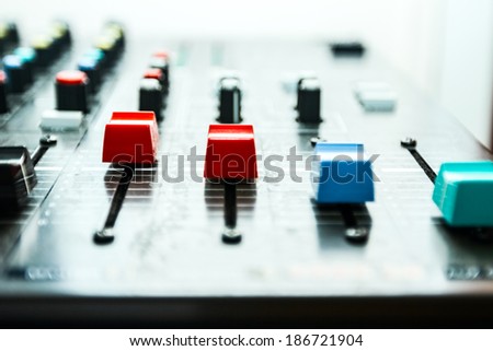 Sound studio adjusting record equipment, music mixer