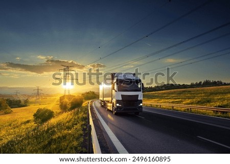 Similar – Image, Stock Photo Car trailer with high blue tarpaulin made of plastic in front of brittle hedge and blue sky on gravel in natural colors in Lemgo near Detmold in East Westphalia-Lippe