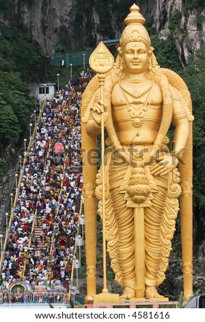 lord Murugan big statue and thousand people climbing stairs during thaipusan festival, Kuala Lumpur, Malaysia