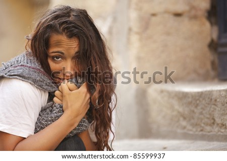 poor young woman in cold weather