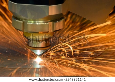 Close-up scene the fiber laser cutting machine cutting  machine cut the metal plate. The hi-technology sheet metal manufacturing process by laser cutting machine.  Foto stock © 