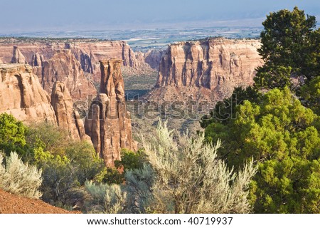 Towers and steep bluffs rise above a deep chasm in the Colorado National Monument near Grand Junction