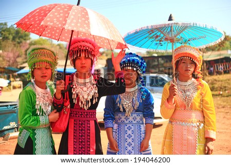 PETCHABUN, THAILAND - JANUARY 1 : Mong family with traditional clothes and silver jewelery in Mong hitt tribe minority village on January 1, 2014 in Petchabun, Thailand.