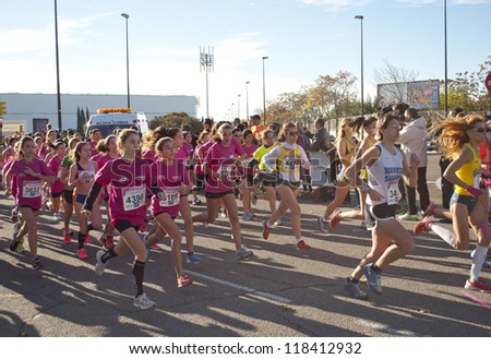 SARAGOSSA, SPAIN - NOVEMBER 11: About 5,000 women ran in the women\'s race in Saragossa to fight cancer, on November 11, 2012, in Saragossa, Spain.