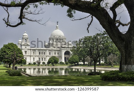 Kolkata, India. View of the British built, colonial building, the Victoria Memorial photographed from within the palatial gardens in Kolkata (Calcutta), Bengal, India, on a bright sunny day.