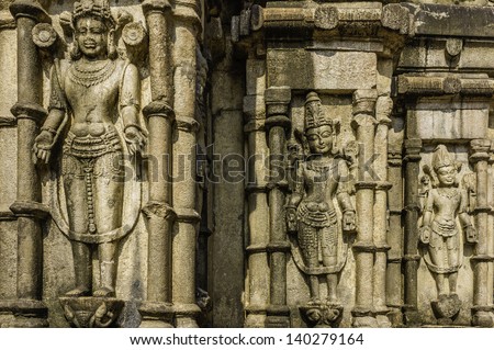 Guwahati, Assam, India. A close up view of stone carvings of Hindu religious Gods and Goddesses on the outside face of the 16th Century Hindu Kamakhya Temple, in Guwahati, Assam, India.