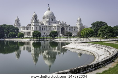 KOLKATA, INDIA - OCTOBER 04: The Victoria Memorial with front elevation reflected in water feature on October 04, 2011 in Kolkata, India.