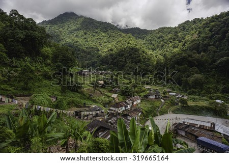 Bomdila, Arunachal Pradesh, India. Shanty town surrounded by vegetation and mountains along the main highway between Assam and Tawang in Arunachal Pradesh, India.