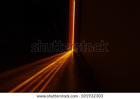 light shining on the floor through door gap