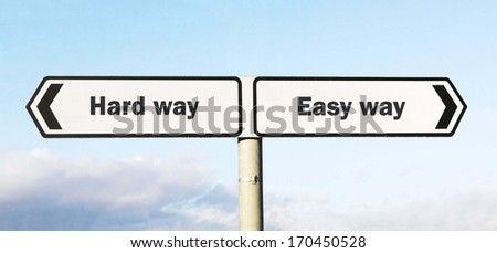 Signpost with hard way or easy way direction choices