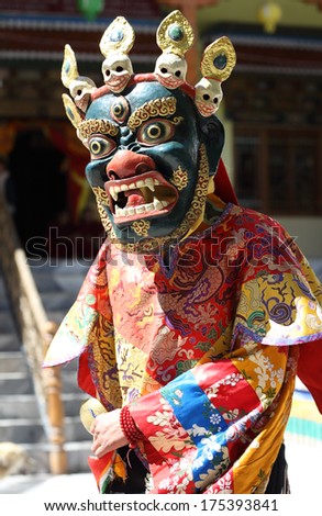 LEH - INDIA - SEPTEMBER 25, 2013: Unidentified dancer at a traditional Buddhist mask dance of the annual Ladakh Festival 2013 on September 25, 2013 in Leh, India.