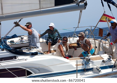 LANZAROTE, SPAIN - OCT. 11: Crew of the yacht number 3 during the race  on Russian BOSS Regatta,  Oct.  11 2011, Canary islands, Spain