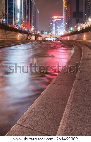 SEOUL, SOUTH KOREA - FEBRUARY 28, 2015: Night light at Cheonggyecheon stream. The stream is a 10.9Â km long, modern public recreation space in Seoul downtown.