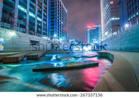 SEOUL, SOUTH KOREA - FEBRUARY 28, 2015: Night light at Cheonggyecheon stream. The stream is a 10.9Ã?Â km long, modern public recreation space in Seoul downtown.