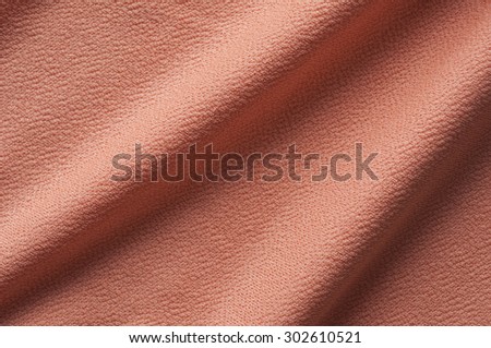 Sweet orange clothes fabric texture background.
