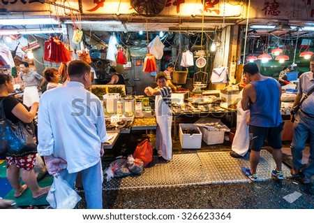 Hong Kong, China - October 03, 2015 : People waking in Bowrington Road Market near by Times Square Hong Kong.