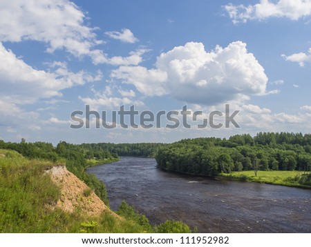 Landscape with the rough river. Russia. Novgorod region. River Msta.