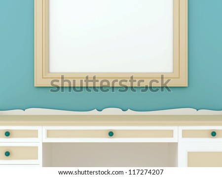 Part of the desktop and the frame on the background of blue wall