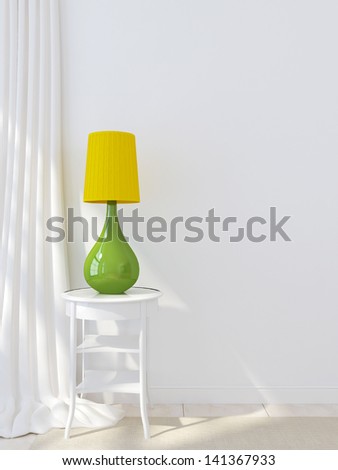 Yellow green table lamp on a background of white interior
