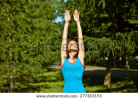sporty athletic woman on a grass background. outdoor sports. healthy sport lifestyle. fitness, yoga