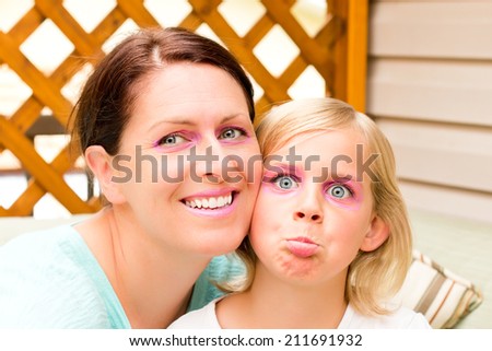 Mother and Daughter Goofing Around for the Camera