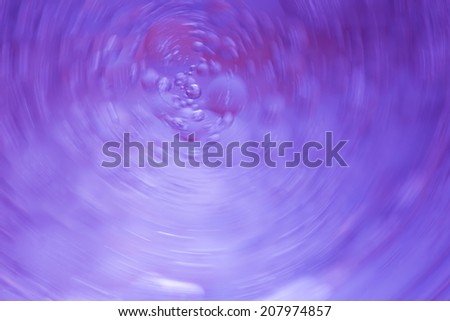 abstract swirl background of oil droplets on water surface