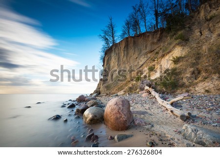 Beautiful cliff on sea shore. Long exposure photo. Cliff in Orlowo, Gdynia.