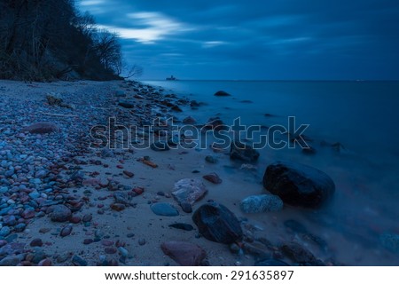 Baltic shore near Gdynia. Beautiful dramatic weather seascape of polish shore of Baltic sea photographed at night.
