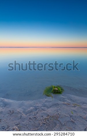 Beautiful seascape of Bay before sunrise. Calm place in Jastarnia in Poland, Gdanska bay.