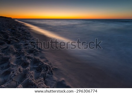 Beautiful sunset over Baltic sea. Summer landscape of polish sea beach.