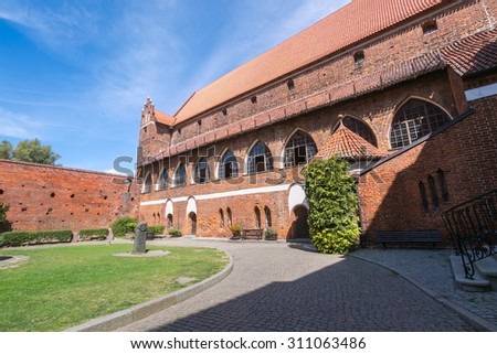 OLSZTYN, POLAND - AUGUST 21, 2015: Old teutonic castle in Olsztyn (Gothic Crusaders castle), tourist attraction of eastern Poland