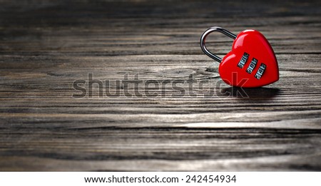 Heart lock on old wood background.Valentines Day background.