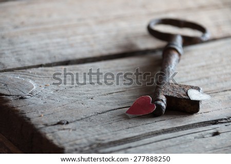 Love, valentine  background. Old key and paper heart