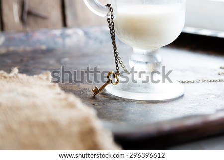a healthy diet key to health idea, milk and golden key