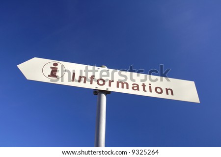 information direction board with blue sky in the background