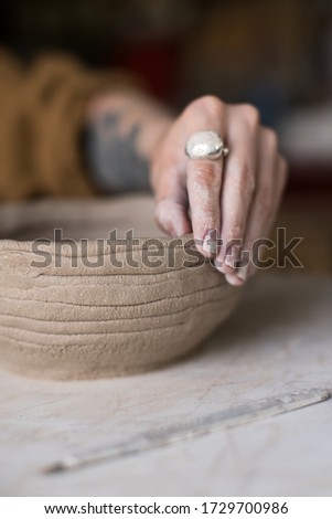 Similar – Foto Bild Kunsthandwerker bei der Herstellung von Tontöpfen