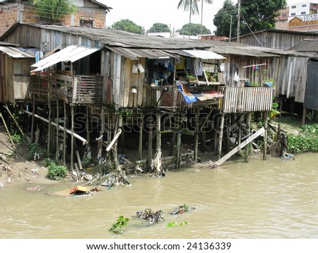 Shanty town in Manaus Amazonia, Brazil.  A favela is a specifically portuguese word for a shanty town. The Wooden houses built on high stilts called palafitas