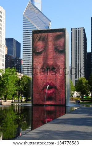 CHICAGO,IL - MAY 19 : The Jaume Plensa\'s Crown fountain on May 19, 2012 in Millennium Park, Chicago. An interactive work of public art and video sculpture featured. It operates from May to October.