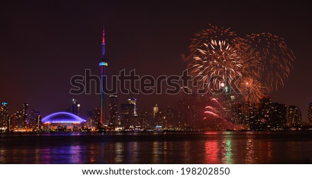 TORONTO - JULY 1: Fireworks in Toronto on july 1,2013, celebrating Canada Day which on July 1, 1867, united three colonies into a single country called Canada with enactment of the Constitution Act