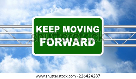 Keep Moving Forward Road Sign with a blue sky in a background