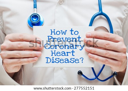 How to Prevent Coronary Heart Disease? Written on a Card in Hands of Medical Doctor