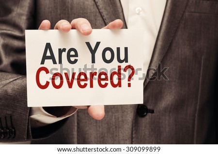 Are you Covered? Man holding a card with a message text written