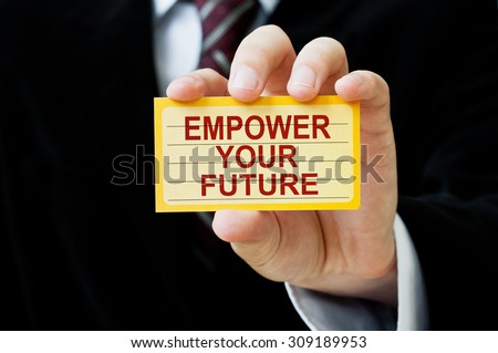 Empower your Future. Man holding a card with a message text written on it