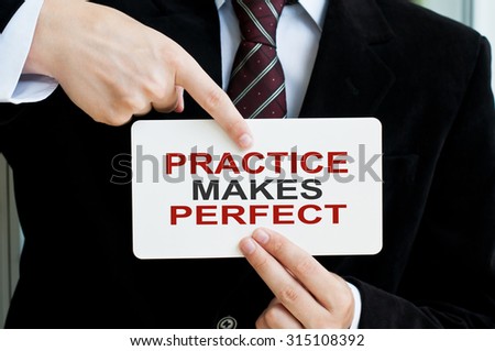 Practice Makes Perfect card in male hands