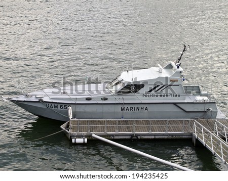 PORTO, PORTUGAL - MAY 18: A Portuguese Navy Boat docked on the Douro River Port on May 18, 2014 in Porto.