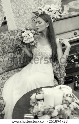 Black and white retro photo of young bride
