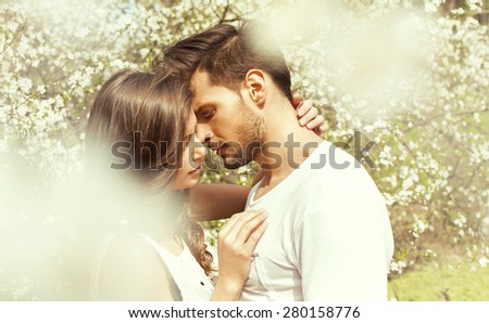 Portrait of kissing couple